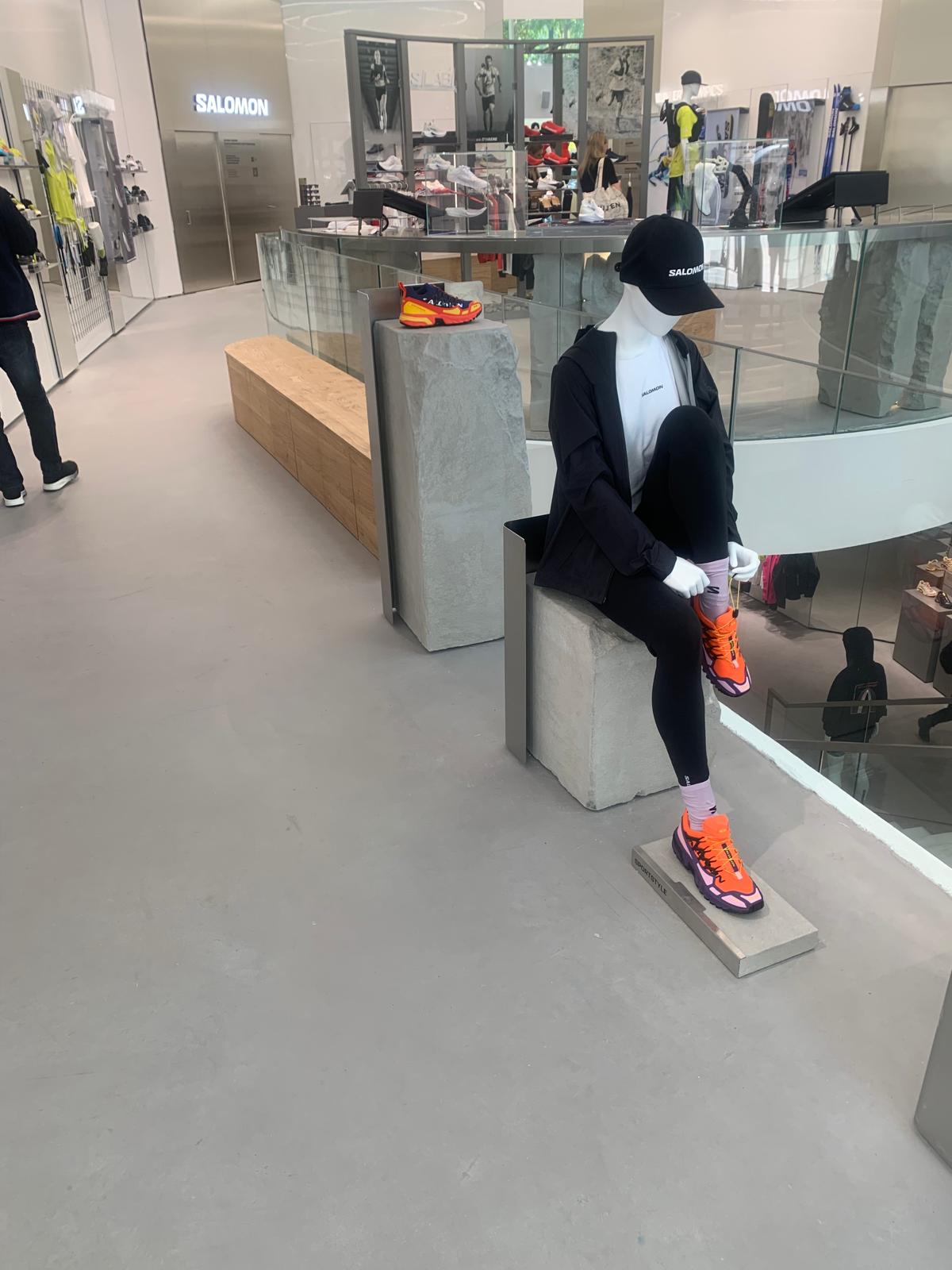 Microcement flooring install in a department store with mannequin